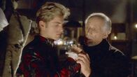 Retro Puppet Master – L-R: Young Toulon (Greg Sestero), Afzel (Jack Donner)
