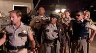 Reno 911! – L-R: Lieutenant Jim Dangle (Thomas Lennon), Deputy S. Jones (Cedric Yarbrough), Deputy Raineesha Williams (Niecy Nash), Deputy James Garcia (Carlos Alazraqui), Deputy Trudy Wiegel (Kerri Kenney), Deputy Travis Junior (Robert Ben Garant), Deputy Clementine Johnson (Wendi McLendon-Covey)