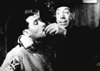 Don Camillos Rückkehr – Paolo Stoppa (Faschist), Fernandel (Don Camillo).