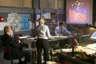 Mayday - Alarm im Cockpit – RE-ENACTMENT - Bouillard (played by Stuart Clow) sits at the head of the table and watches the projected navigation animation of ADI showing the place was banking when hit, other investigators (played by background preformers) look on. â€¨â€¨(photo credit: Cineflix/Ian Watson)