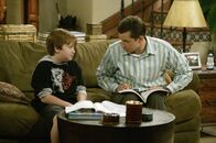 Two and a Half Men – Angus T. Jones (Jake), Jon Cryer (Alan).