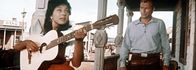 Winnetou I – Als Abgesandter der Eisenbahnlinie versucht Old Shatterhand (Lex Barker, r.) den Schurken Santer von seinem unmenschlichen Plan abzubringen und die Apachen zu versöhnen, um möglichen Kämpfen vorzubeugen. Kann ihm das gelingen?