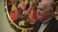 Weird War Two – FLORENCE, ITALY - Dr. Claudio Di Benedetto, Director of Florence’s Uffizi Library, stands in front of Domenico Ghirlandaio's Adoration of the Magi.