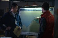 Mayday - Alarm im Cockpit – A Nepalese investigator (played by Leon Aureus) and Andrew Robinson (played by Philip Graeme) map out the trajectory of Pakistan International Airlines Flight 268's stepped descent over the Himalayan mountains that led to the tragic accident. (Cineflix 2019/Darren Goldstein)