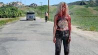 31 - A Rob Zombie Film – L-R: Doom-Head (Richard Brake), Charly (Sheri Moon Zombie)