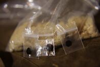 Drogen im Visier – MEXICO- A bag of Heroin & little baggies of black tar heroin at a street dealers house.