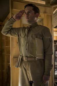 Catch-22 – Sgt. Towser (Martin Delaney)