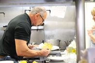 Restaurant Impossible – Robert inspects cauliflower, as seen on Restaurant Impossible.