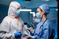 Autopsy - Prominente Todesfälle – Doctors holding samples and talking in hospital, coronavirus concept.