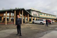 Hotel Impossible – Host Anthony Melchiorri poses outside Hooligan's Lodge in Soldotna, Alaska.