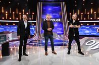 Quizduell-Olymp – Moderator Jörg Pilawa (M.) mit den Kandidaten des Teams „Virtuos“: Till Brönner (l.) und David Garrett (r.), beide Musiker.