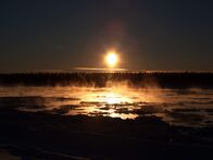 Yukon Men – Changing weather patterns have affected the freezing of the Tanana River, limiting travel for natives.