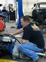 Fast N' Loud – Brian Hacker preps the new engine for the 1967 Ford Mustang Convertible.
