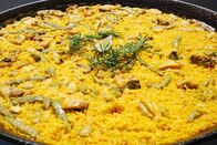 Zu Tisch ... – Im größten Reisanbaugebiet Spaniens, in der Albufera Valenciana, wurde die Paella erfunden.