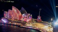 Fabriken der Superlative – CGI image - guitar larger than the Sydney Opera House.