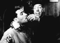 Don Camillos Rückkehr – Paolo Stoppa (Faschist), Fernandel (Don Camillo).