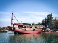 Verrückt nach Meer – Ein Boot in Sanya auf der Halbinsel Hainan in China.