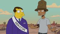 Die Simpsons – Was passiert nur mir Springfield? Bürgermeister Quimby (l.) ist ratlos: Nicht mal Pharrell Williams (r.) kann ihm helfen, ein Lied für die Stadt zu finden ...