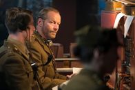 Mrs. Wilson – Alec Wilson (Iain Glen, centre) - (C) Â