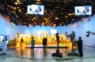 Die Welt am Abend – blurred silhouette cameraman with staff in TV studio station