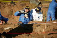 Mayday - Alarm im Cockpit – REENACTMENT - NTSB Investigator (played by Byron Abalos) examines a piece of wreckage discovered at the site of world famous golfer Payne Stewart's fatal plane crash.