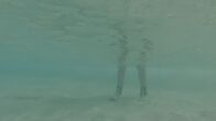 When Sharks Attack - Hai-Alarm – TAMPA, FLA.- Dramatic reconstruction of attack on Kerry Anderson, showing his boots underwater. (Photo credit: National Geographic Channels/Dane Lawing)