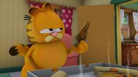 The Garfield Show – Garfield beißt in die von Jon geholte Pizza, doch entsetzt muss er feststellen, dass sie nicht wie gewohnt schmeckt.