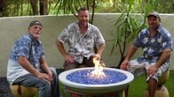 Die Beckenbauer - Pools der Superlative – John Old Man Messner, Lucas Congdon, and Chris Crash Warren sit by the completed fire pit.