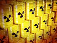 Quarks – background of 3d yellow barel and radioactive sign