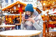 ATV - Die Reportage – Beautiful young woman drinking hot punch, mulled wine on Christmas market.