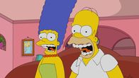 Die Simpsons – Marge (l.); Homer (r.)