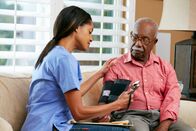 ATV - Die Reportage – Nurse Visiting Senior Male Patient At Home