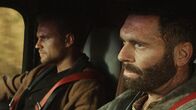 SuperGrid - Road to Death – L-R: Deke (Marshall Williams), Jesse (Leo Fafard)