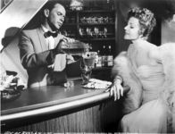 Pal Joey – Joey Evans (Frank Sinatra, l.); Vera Simpson (Rita Hayworth, r.)