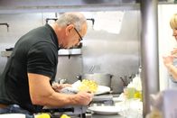 Restaurant Impossible – Robert inspects cauliflower, as seen on Restaurant Impossible.