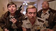 Reno 911! – L-R: Deputy Trudy Wiegel (Kerri Kenney), Lieutenant Jim Dangle (Thomas Lennon), Deputy S. Jones (Cedric Yarbrough)