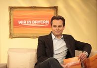 Wir in Bayern – Moderator Michael Sporer.