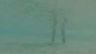 When Sharks Attack - Hai-Alarm – TAMPA, FLA.- Dramatic reconstruction of attack on Kerry Anderson, showing his boots underwater. (Photo credit: National Geographic Channels/Dane Lawing)