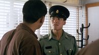 Prison on Fire 1 – Officer 'Scarface' Hung (Roy Cheung, r.)