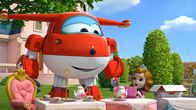 Super Wings – Jett überreicht Maribelle die Halsbänder für ihre Hundewelpen.