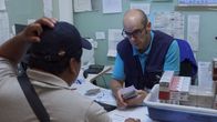 Border Control – Border control officer counting money