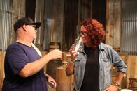 Moonshiners: Master Distiller – Lisa smelling Jason's Gin.