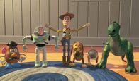 Toy Story Toons – L-R: Mr. Potato Head, Buzz Lightyear, Woody, Slinky Dog, Rex