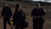American Detective – CSI and police officers at crime scene