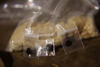 Drogen im Visier – MEXICO- A bag of Heroin & little baggies of black tar heroin at a street dealers house.