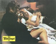 Der Todesengel – Stefano Augenti (Tomas Milian, l.); Fabienne Béranger (Katia Christine, r.)