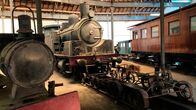Eisenbahn-Romantik – Neben der Dampflok CP 033 lagert in Lagos ein historischer Direktionswagen der portugiesischen Eisenbahngesellschaft.