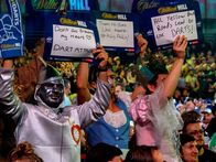 Darts: Weltmeisterschaft – Fans in fancy dress watch the darts action in the arena at Alexandra Palace on December 16, 2018 in London, England.