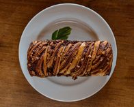 Das große Backen – Chocolate and nuts babka, babka on a white plate
