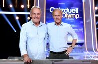 Quizduell-Olymp – Moderatorin Esther Sedlaczek (M.) mit den Kandidaten des "Sport": Jörg Wontorra (l.) und Gerhard Delling (r.), beide Sportjournalisten.